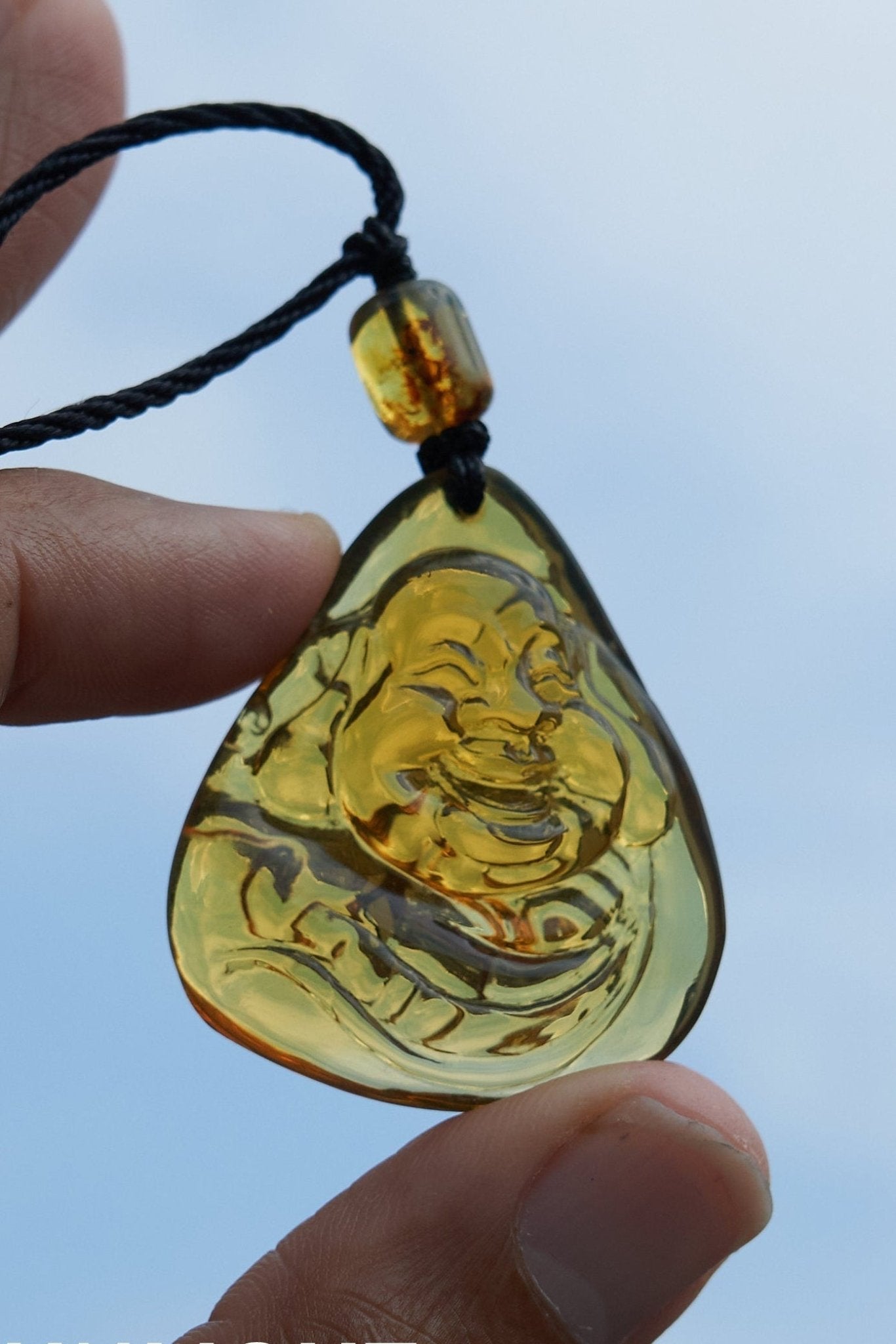 Dominican Blue Amber Buddha Pendant, Buddha Carving. - Larimar Creations