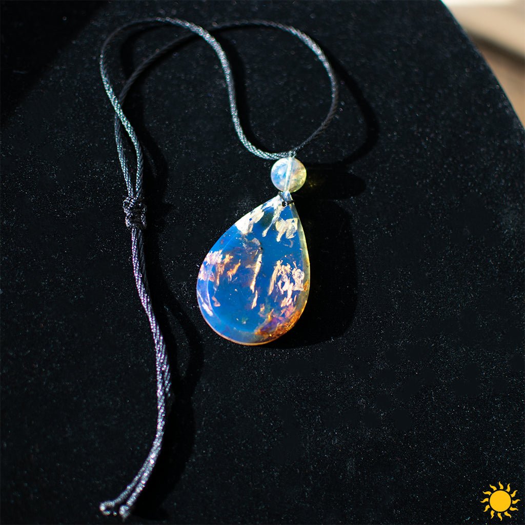 Dominican Blue Amber Cabochon Teardrop Pendant - Larimar Creations