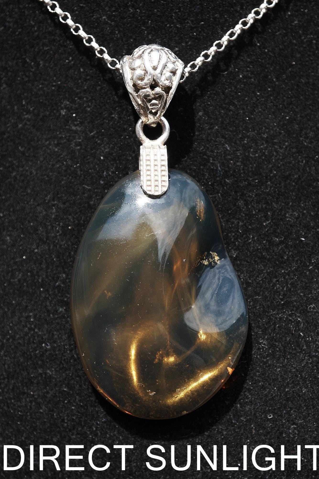 Rare Blue Amber Pendant - 925 Sterling Silver Bail - Larimar Creations