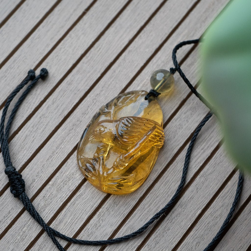 Dominican Blue Amber Pendant, Bird Carved - Larimar Creations