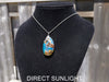 Authentic Dominican Amber Pendant – Handcrafted Jewelry with Rare Blue Glow