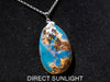 Authentic Dominican Amber Pendant – Handcrafted Jewelry with Rare Blue Glow