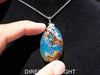 Authentic Dominican Amber Pendant – Handcrafted Jewelry with Rare Blue Glow