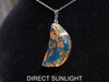 Blue amber cabochon jewelry styled as a unique holiday gift for women