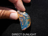 Blue amber cabochon jewelry styled as a unique holiday gift for women