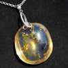 Handcrafted round Dominican blue amber pendant in sterling silver, perfect for gifts