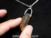 Handcrafted round Dominican blue amber pendant in sterling silver, perfect for gifts