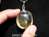 Handcrafted round Dominican blue amber pendant in sterling silver, perfect for gifts