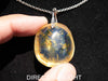 Handcrafted round Dominican blue amber pendant in sterling silver, perfect for gifts