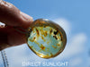 Handcrafted round Dominican blue amber pendant in sterling silver, perfect for gifts