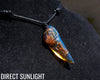 Blue Amber Dominican Pendant Necklace carving shape.