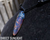 blue amber pendant hand-carved