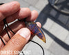 Blue Amber Dominican Pendant Necklace carving shape.