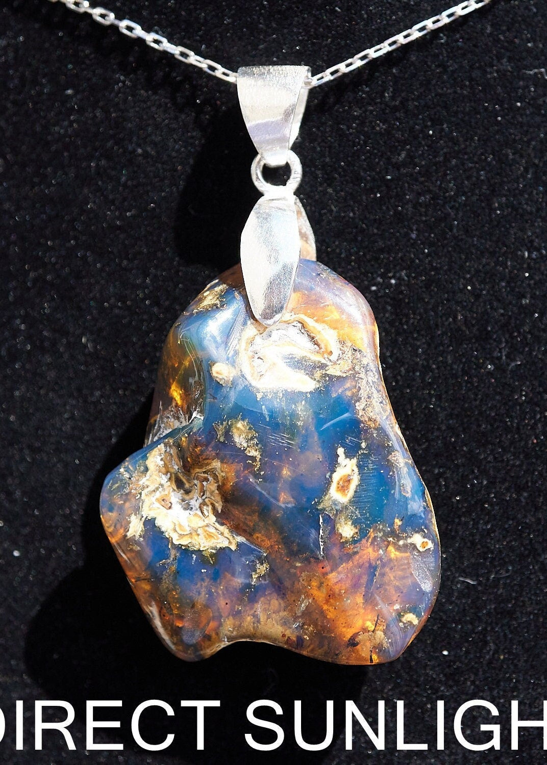Dominican Blue Amber Pendant: Natural Teardrop, Sterling Silver