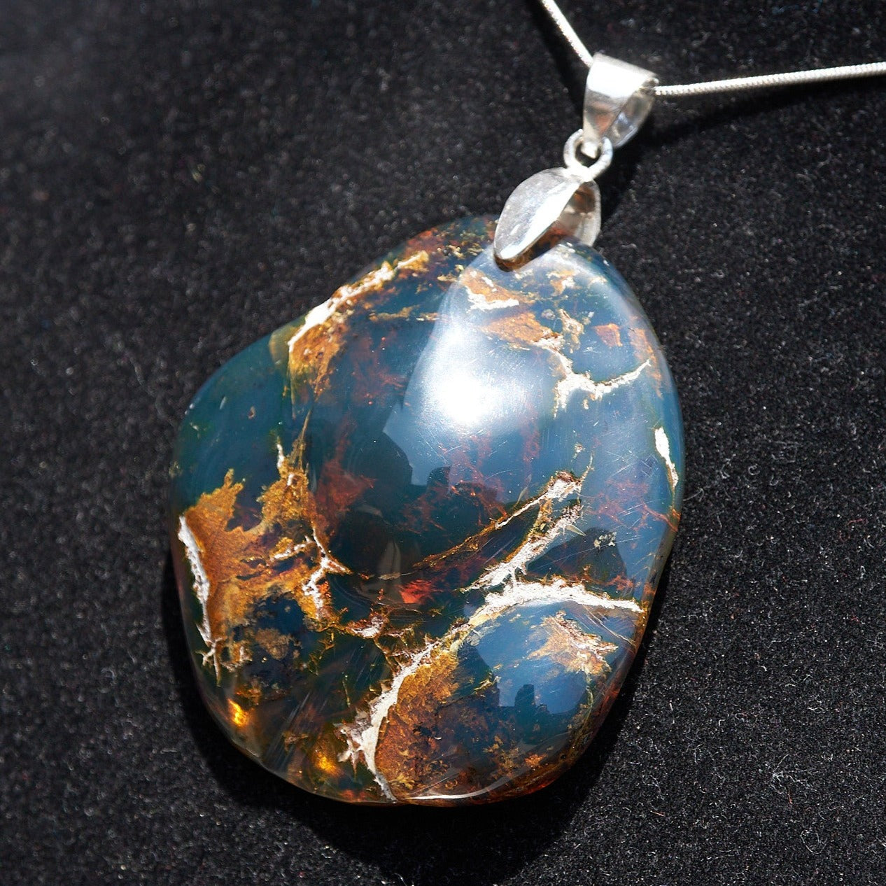 blue amber Dominican pendant
