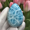 High-quality Larimar cabochon featuring a rich turquoise color and unique marbling