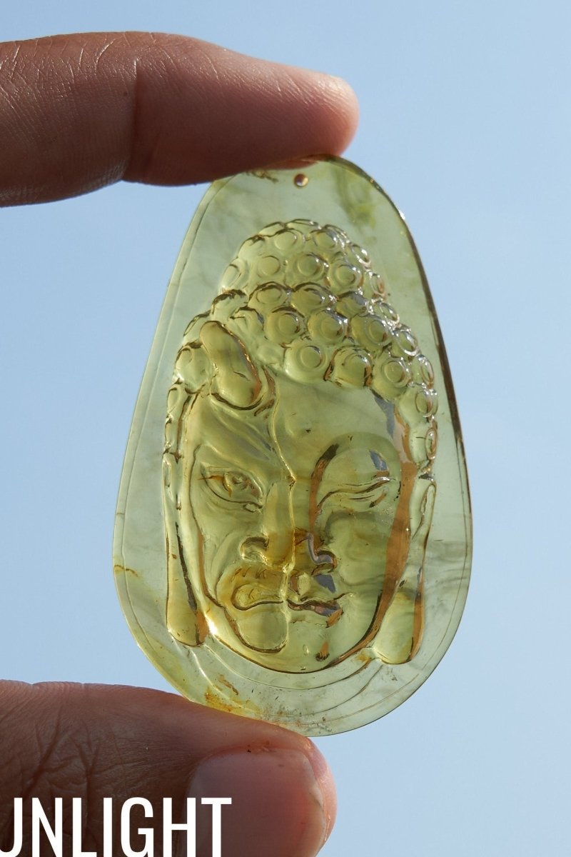 Amber Dominican half face carved buddha - Larimar Creations