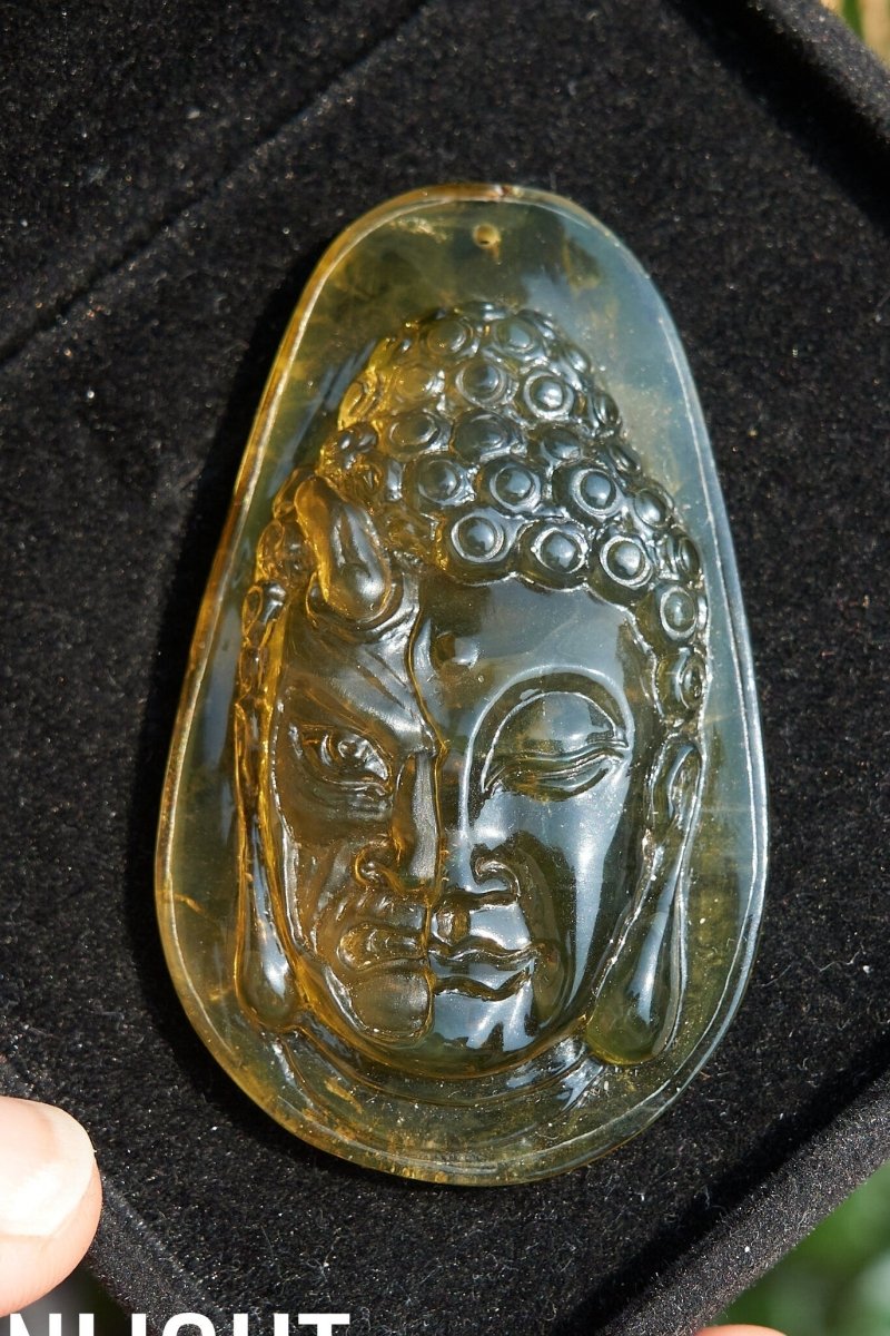 Amber Dominican half face carved buddha - Larimar Creations