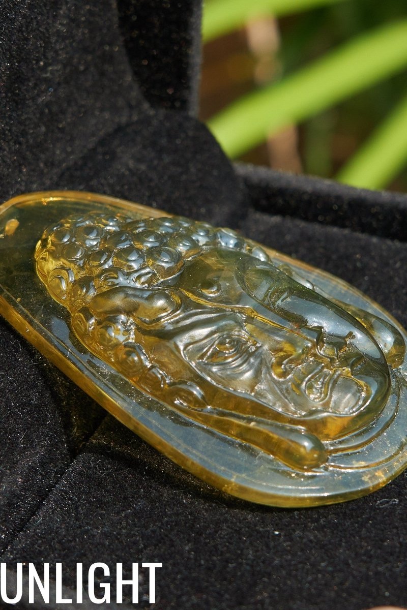 Amber Dominican half face carved buddha - Larimar Creations