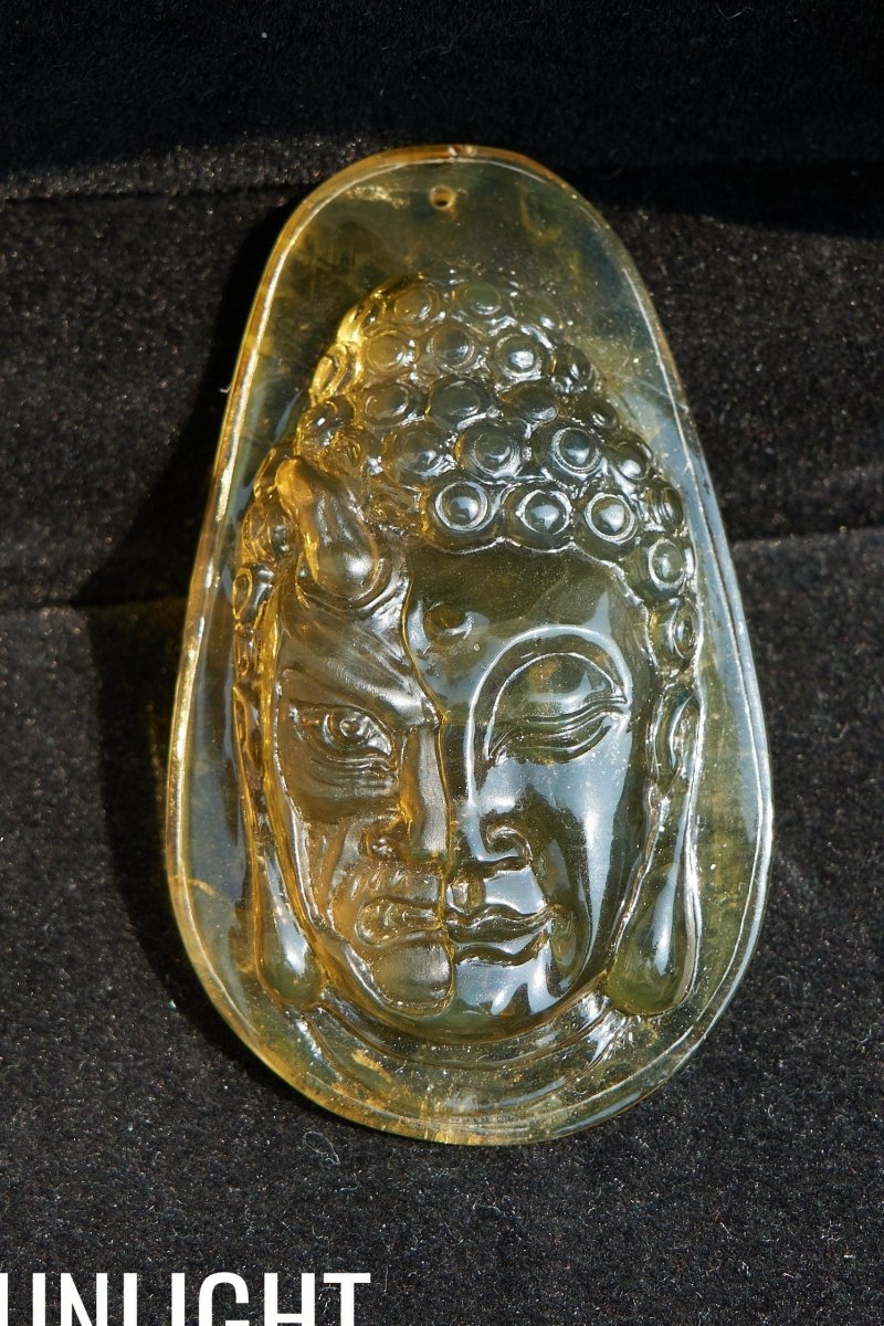 Amber Dominican half face carved buddha - Larimar Creations