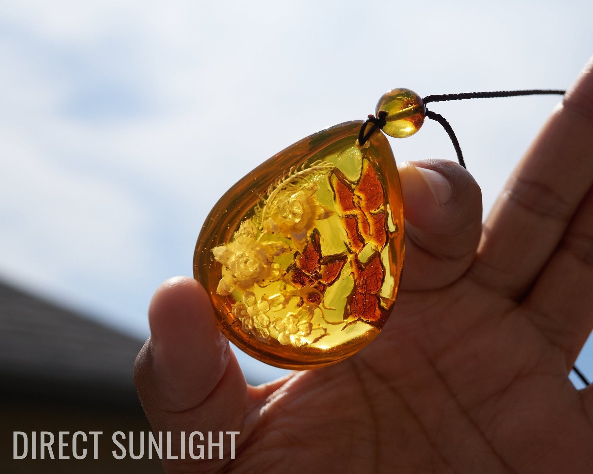 Amber Dominican Pendant Hand Carved 3d Flowers and Butterfly - Larimar Creations