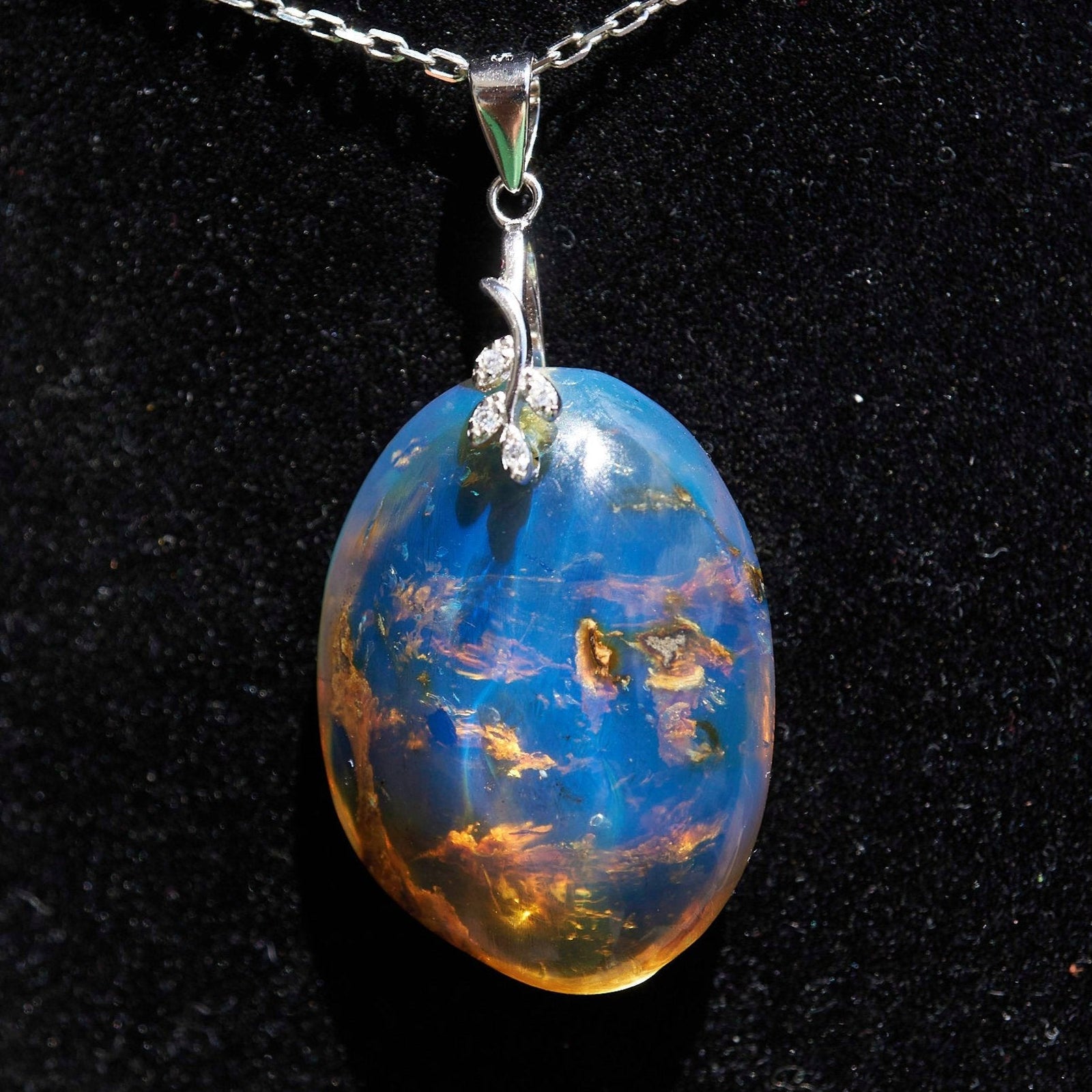 Authentic Blue Amber Dominican Pendant with Bail in 925 Sterling Silver - Larimar Creations