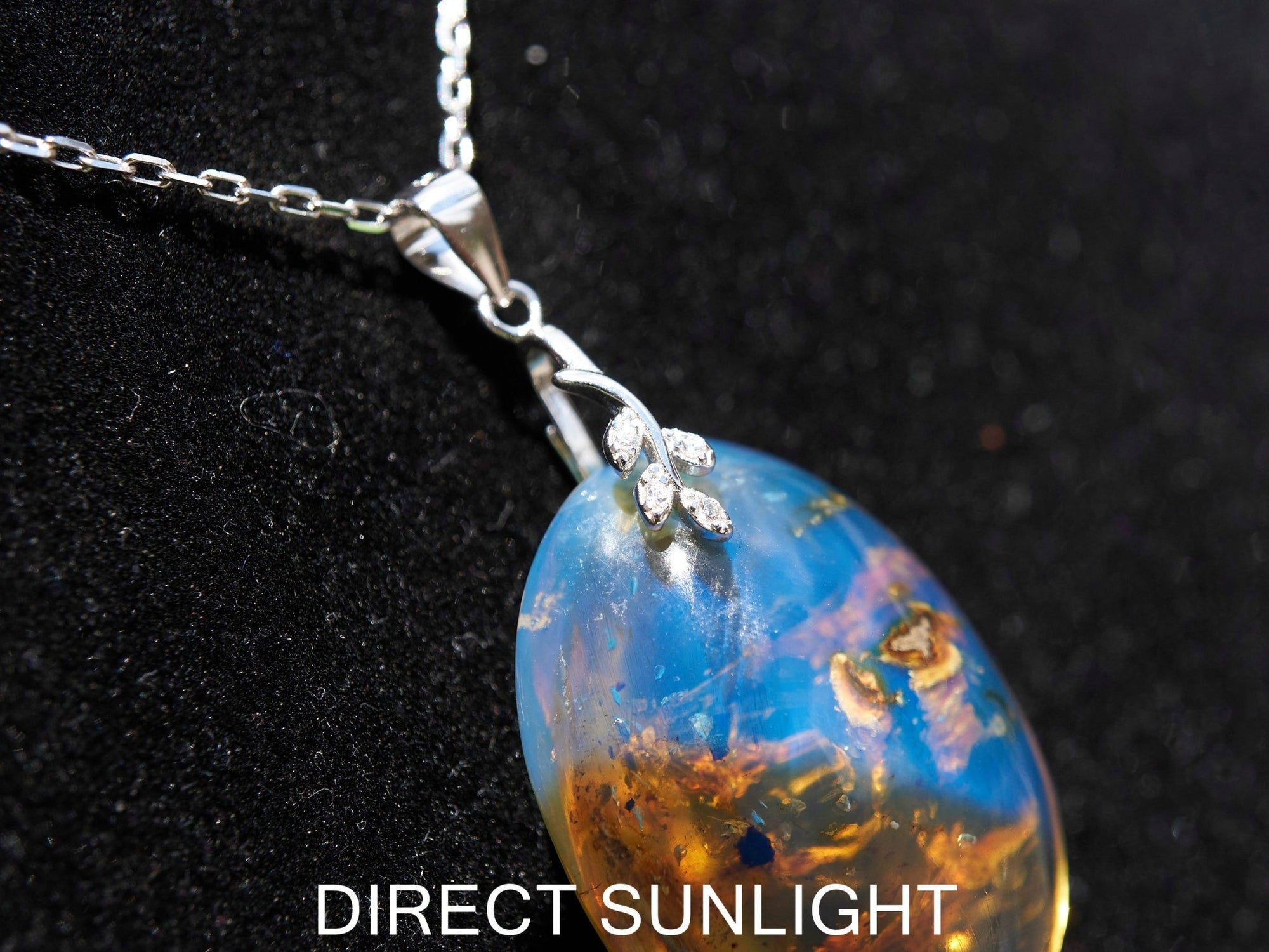 Authentic Blue Amber Dominican Pendant with Bail in 925 Sterling Silver - Larimar Creations