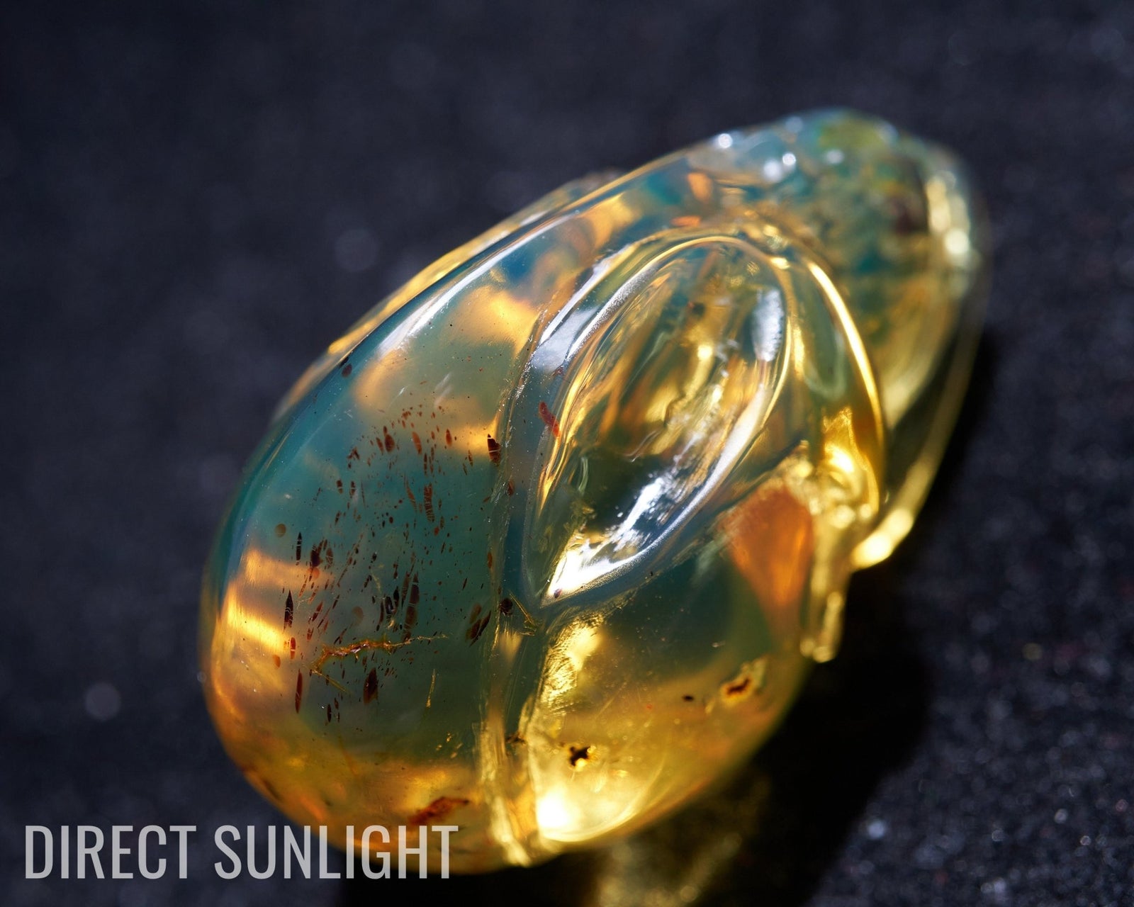 Authentic Green - Blue Dominican Amber Alien Skull | Hand - Carved Collectible - Larimar Creations