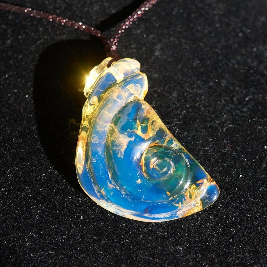 Blue Amber Dominican Pendant Necklace snail shape carving - Larimar Creations