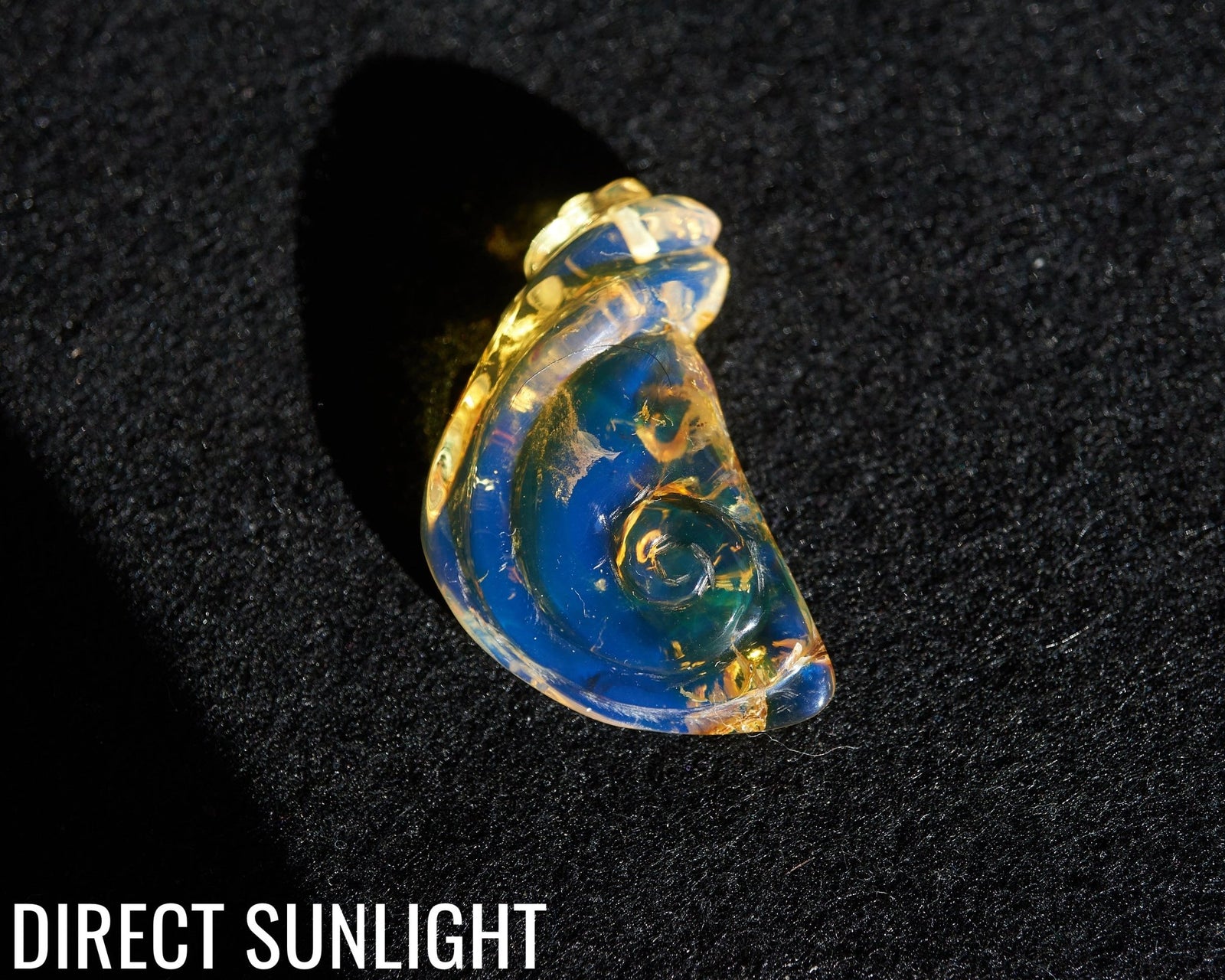 Blue Amber Dominican Pendant Necklace snail shape carving - Larimar Creations
