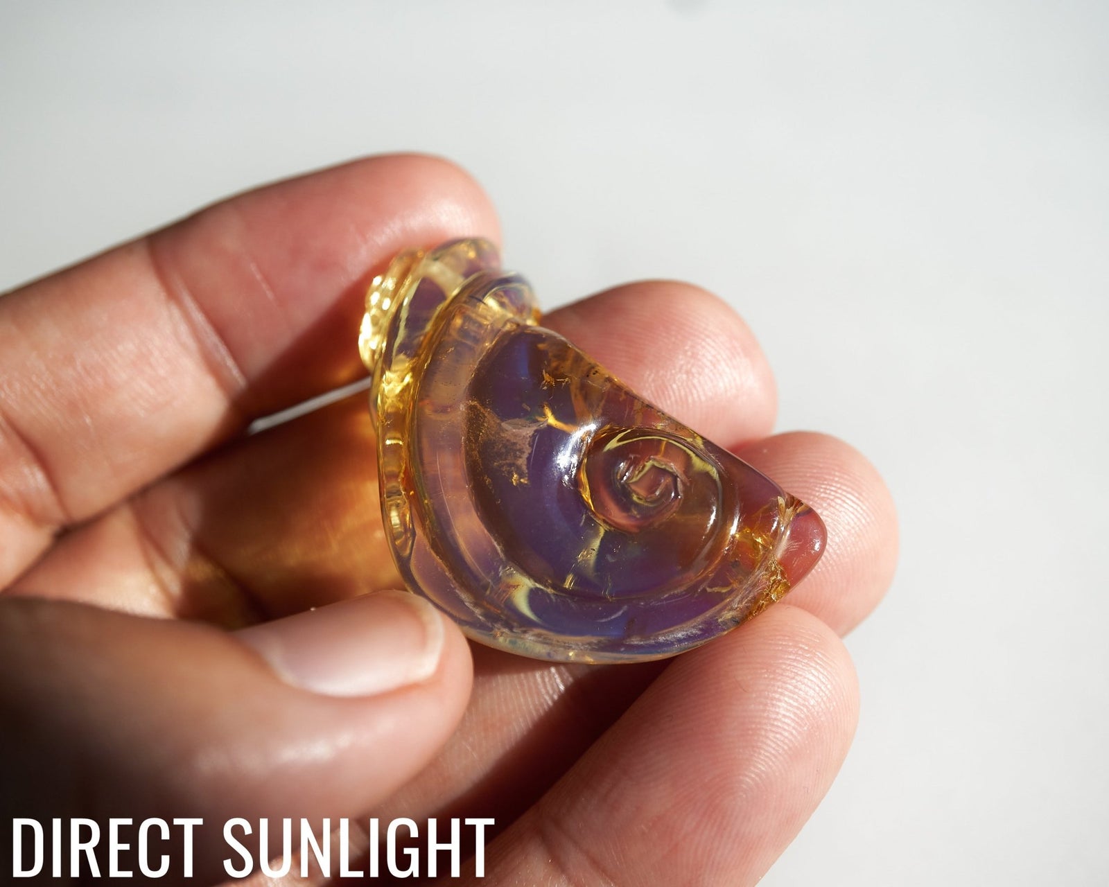 Blue Amber Dominican Pendant Necklace snail shape carving - Larimar Creations