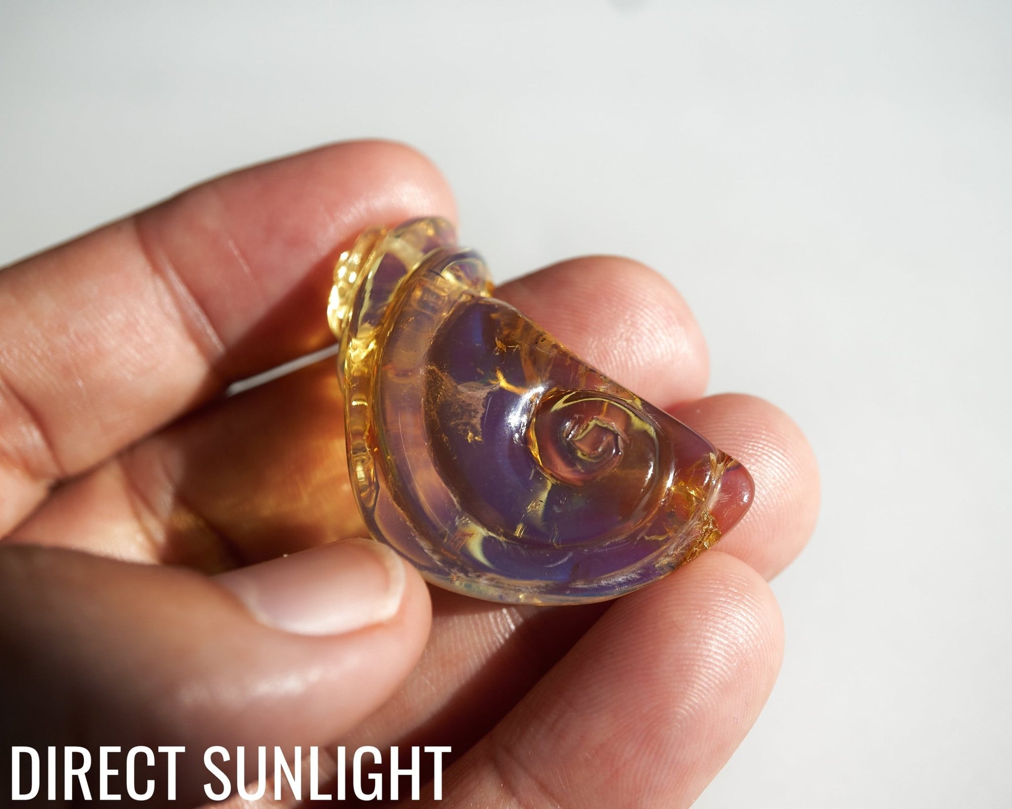 Blue Amber Dominican Pendant Necklace snail shape carving - Larimar Creations