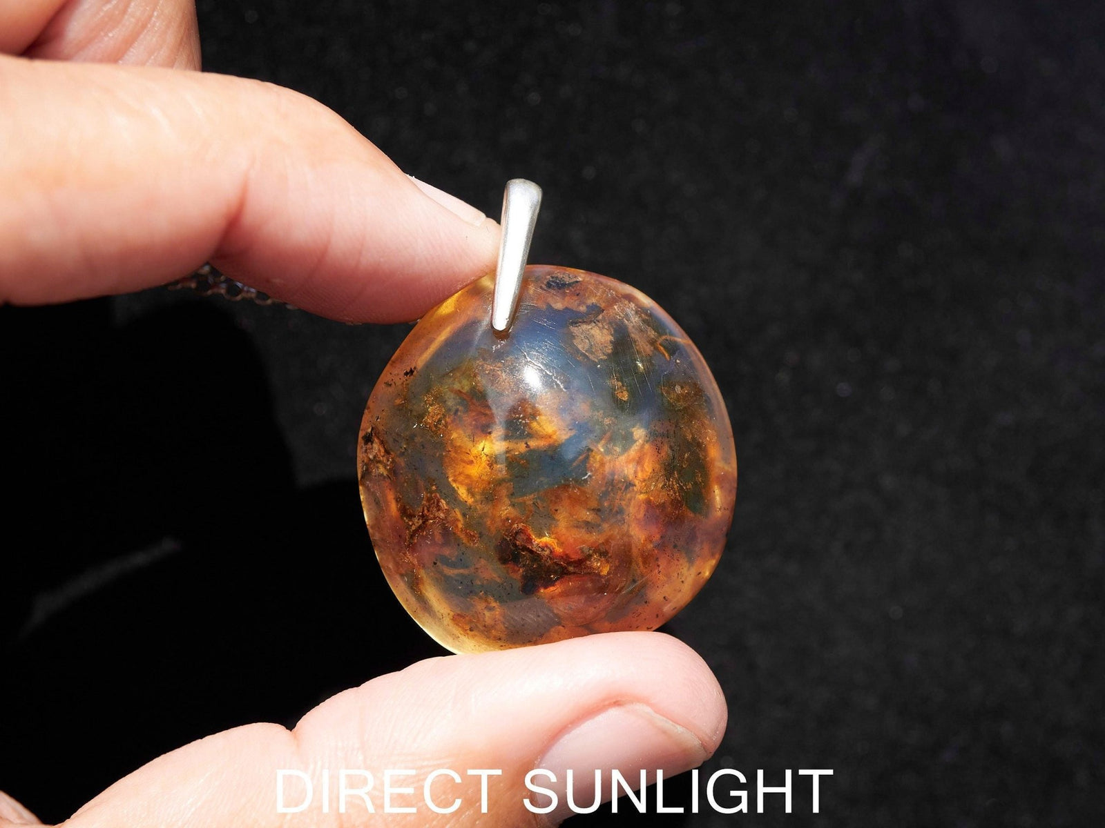 Blue Amber Dominican Pendant round Shape - Larimar Creations