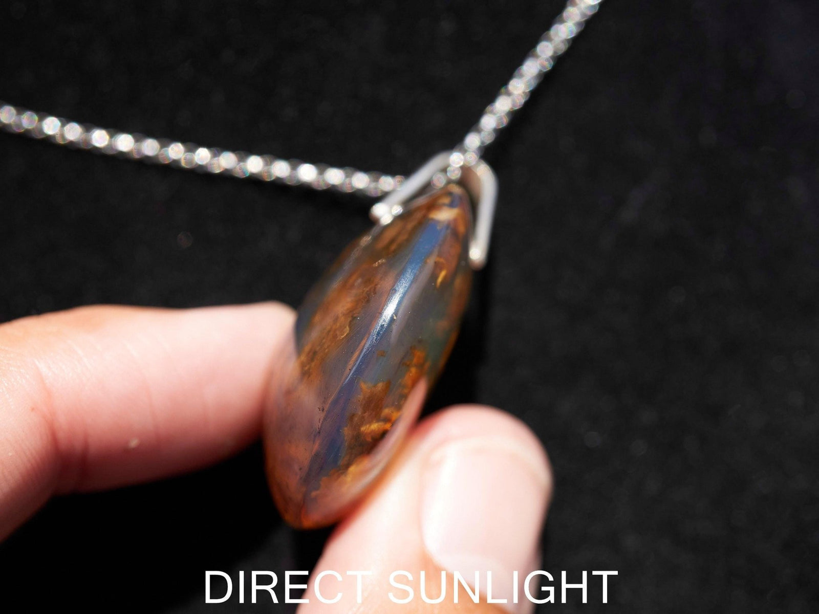 Blue Amber Dominican Pendant round Shape - Larimar Creations