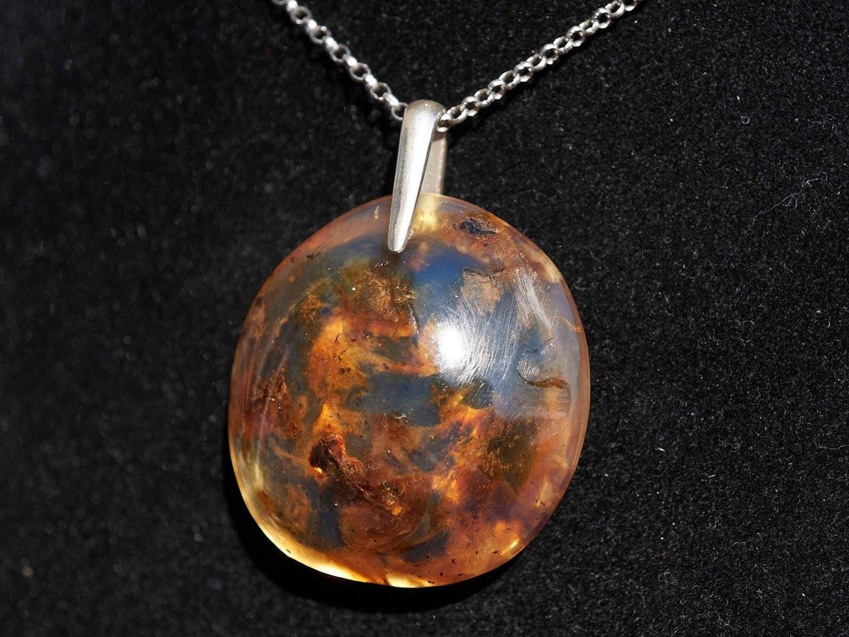 Blue Amber Dominican Pendant round Shape - Larimar Creations