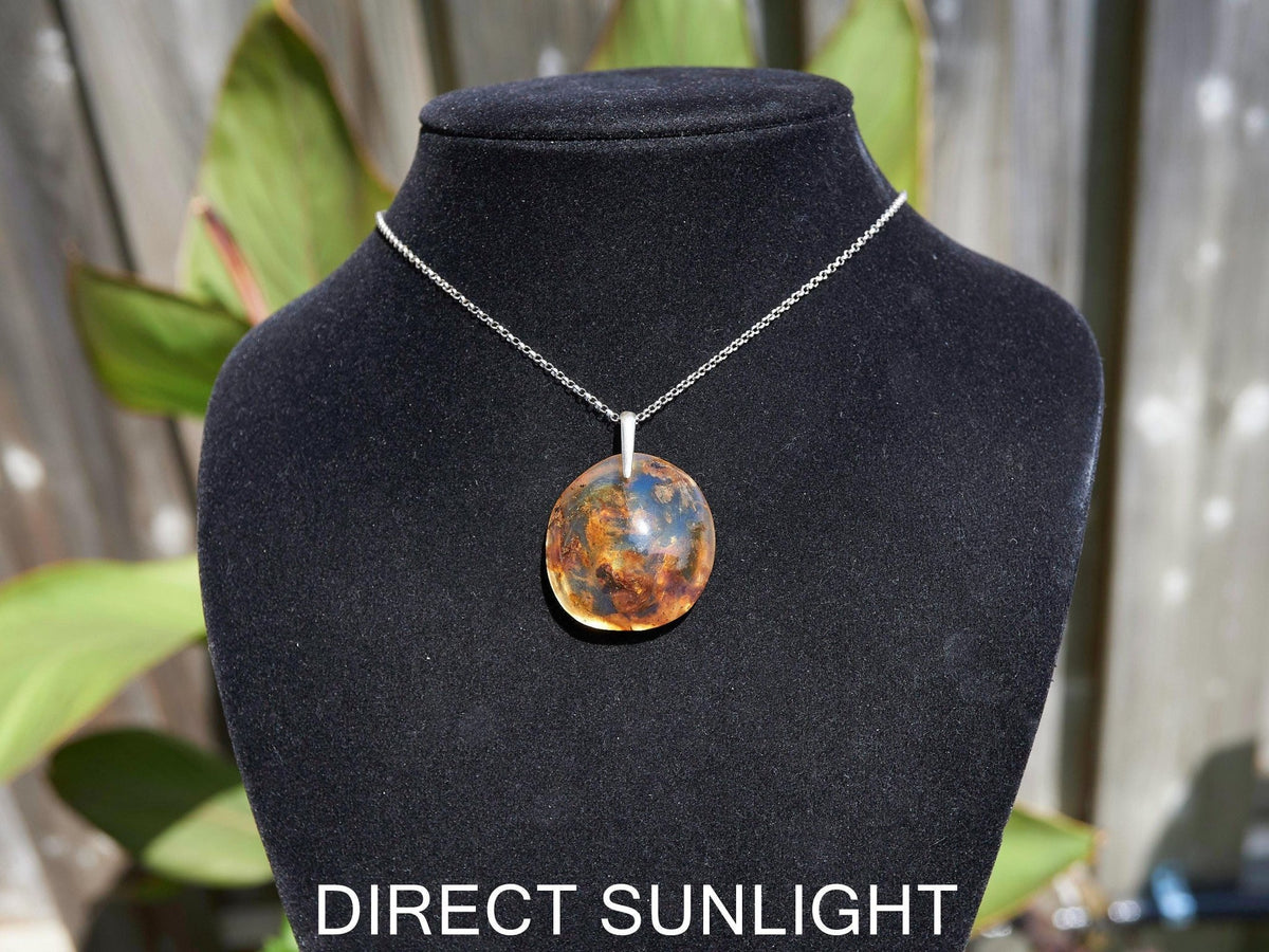 Blue Amber Dominican Pendant round Shape - Larimar Creations