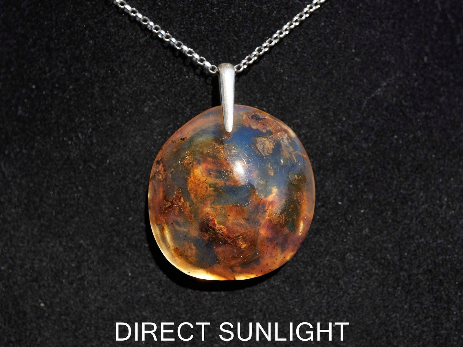 Blue Amber Dominican Pendant round Shape - Larimar Creations