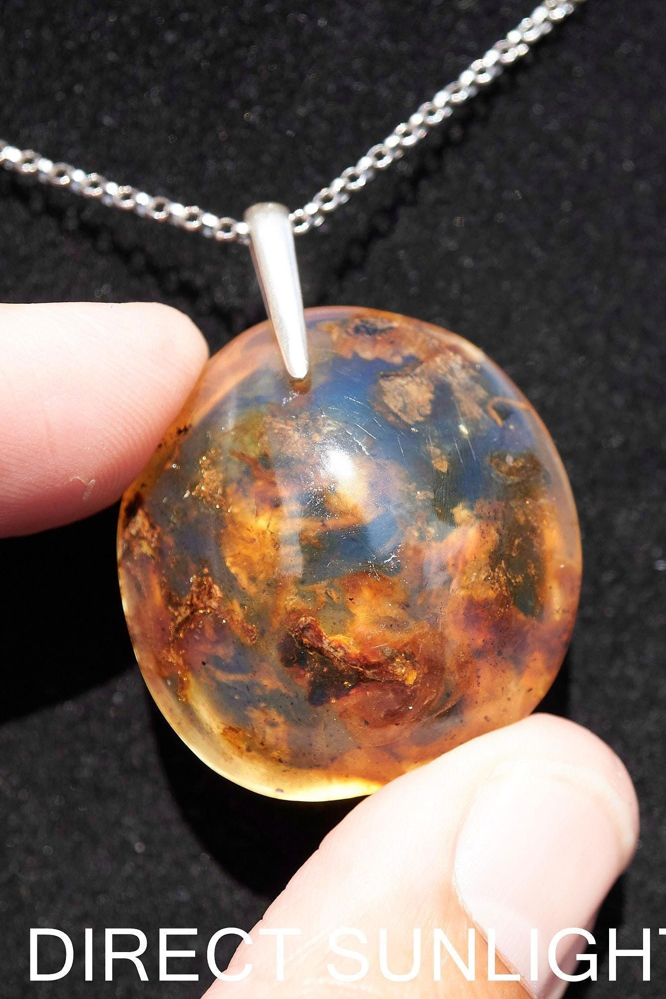 Blue Amber Dominican Pendant round Shape - Larimar Creations