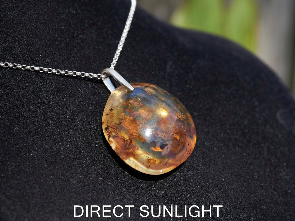 Blue Amber Dominican Pendant round Shape - Larimar Creations