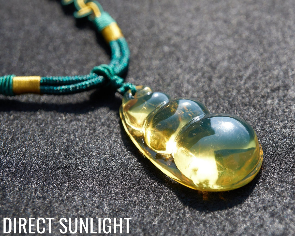 Blue amber necklace carved, Gourd - Larimar Creations