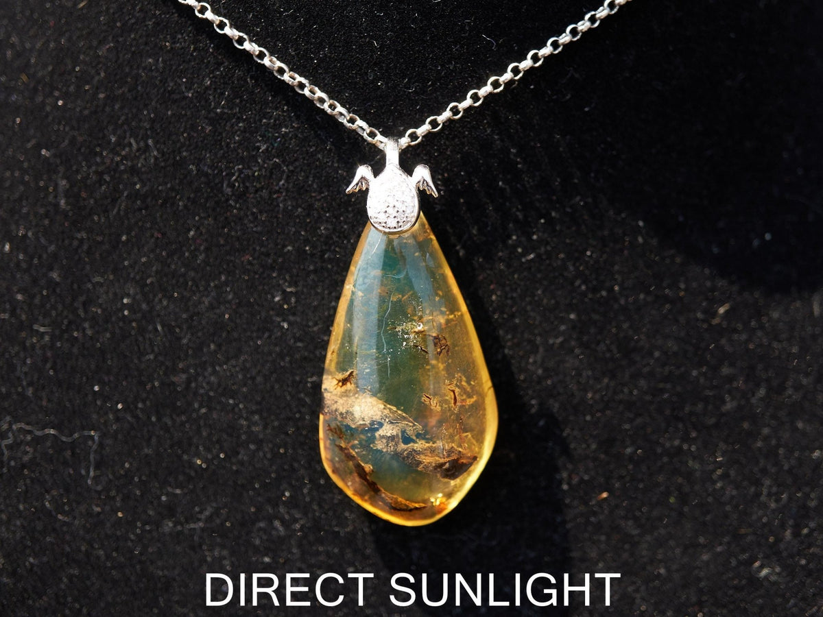 Blue Amber Pendant: Sterling Silver Necklace - Larimar Creations
