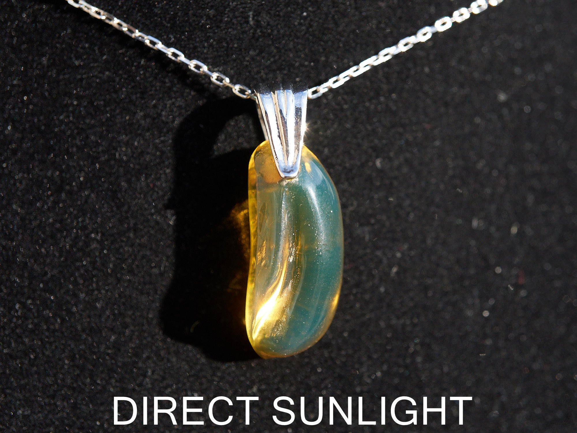 Blue Green Amber Dominican Pendant teardrop shape - Larimar Creations