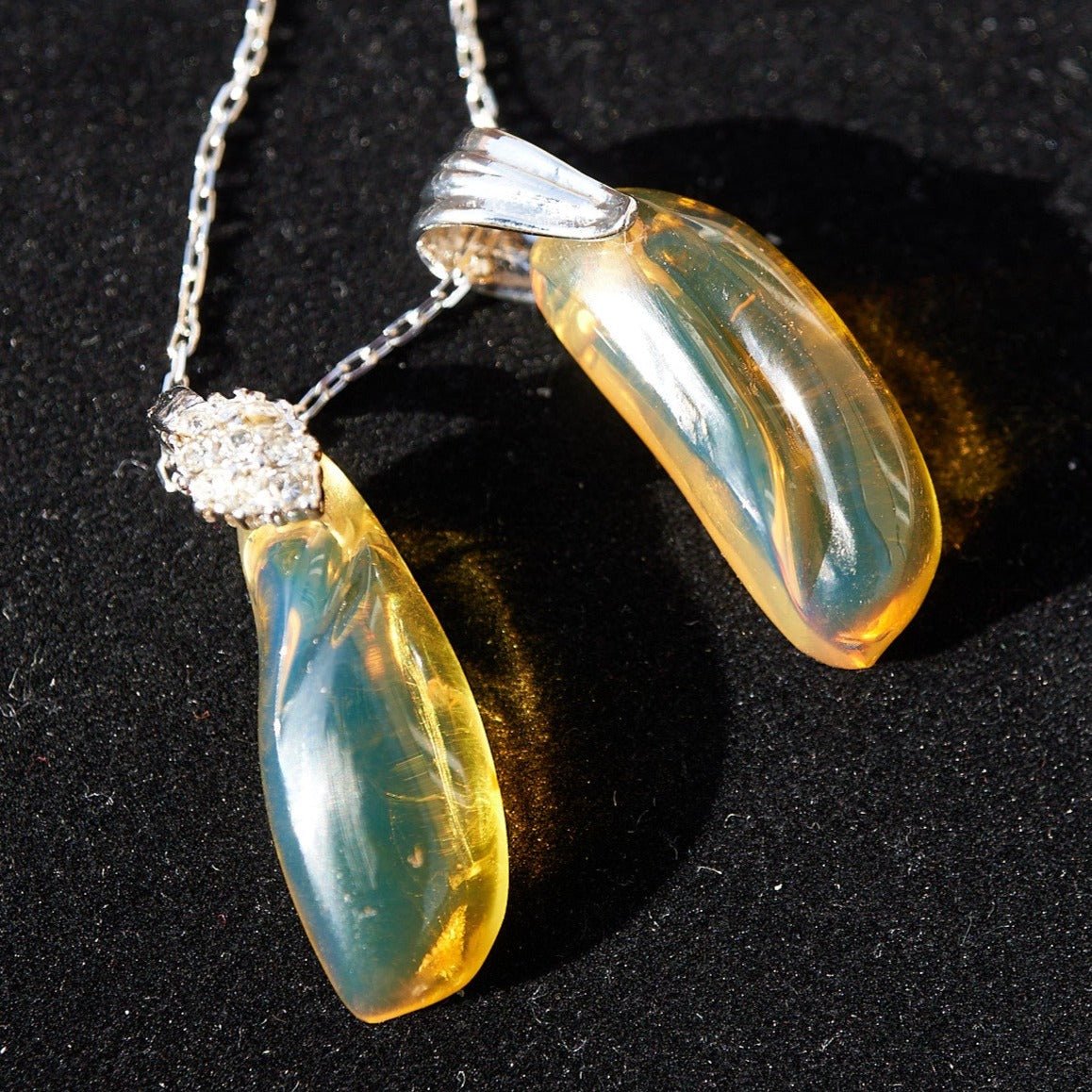 Blue Green Amber Dominican Pendant teardrop shape - Larimar Creations