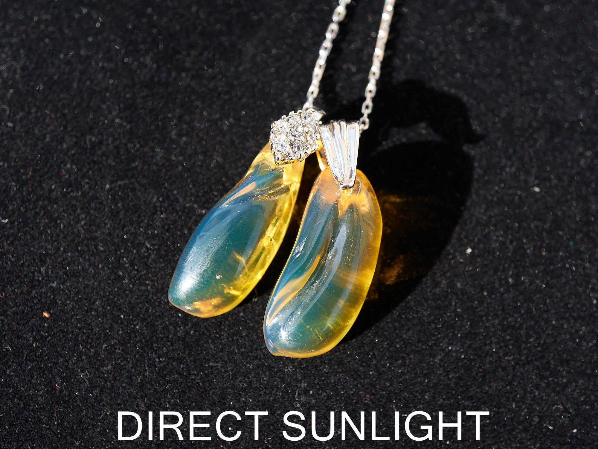 Blue Green Amber Dominican Pendant teardrop shape - Larimar Creations