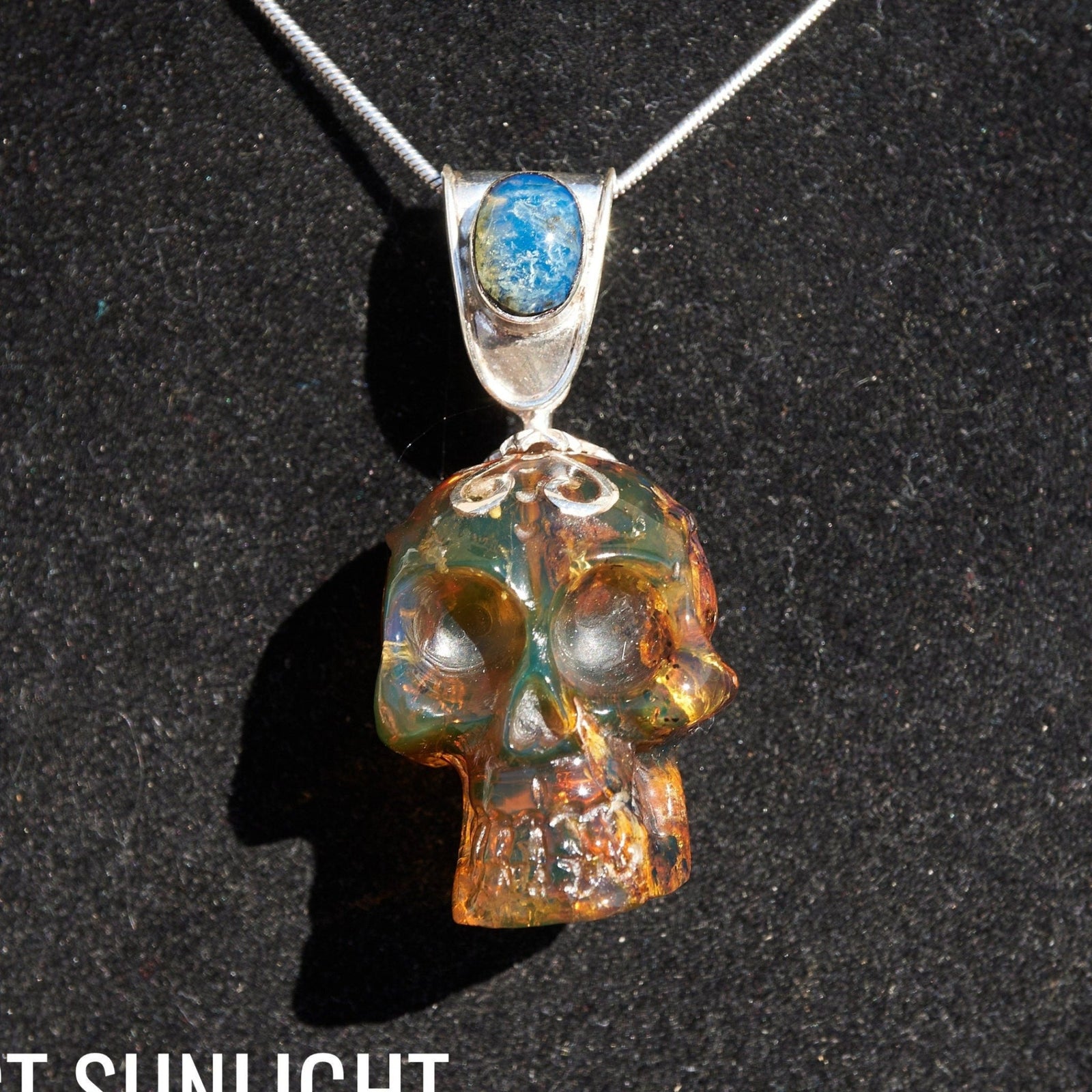 Blue & Green Dominican Amber Skull Pendant | 925 Silver - Larimar Creations