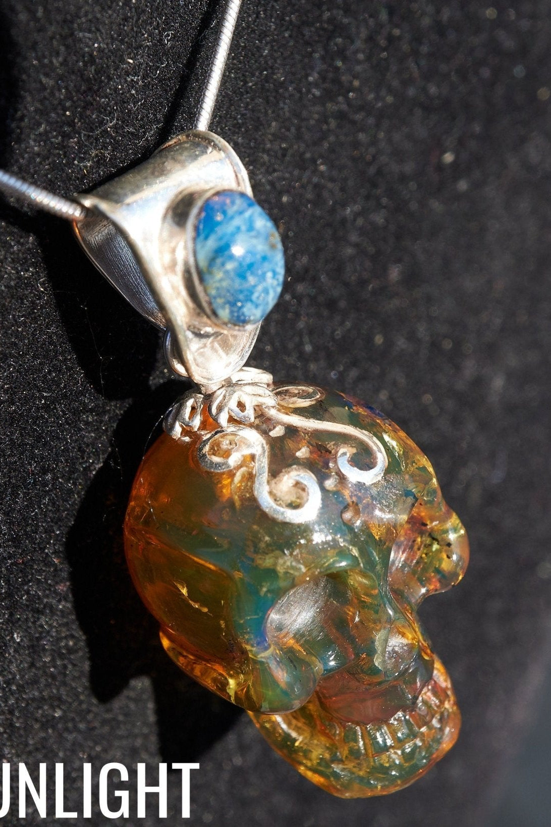 Blue & Green Dominican Amber Skull Pendant | 925 Silver - Larimar Creations