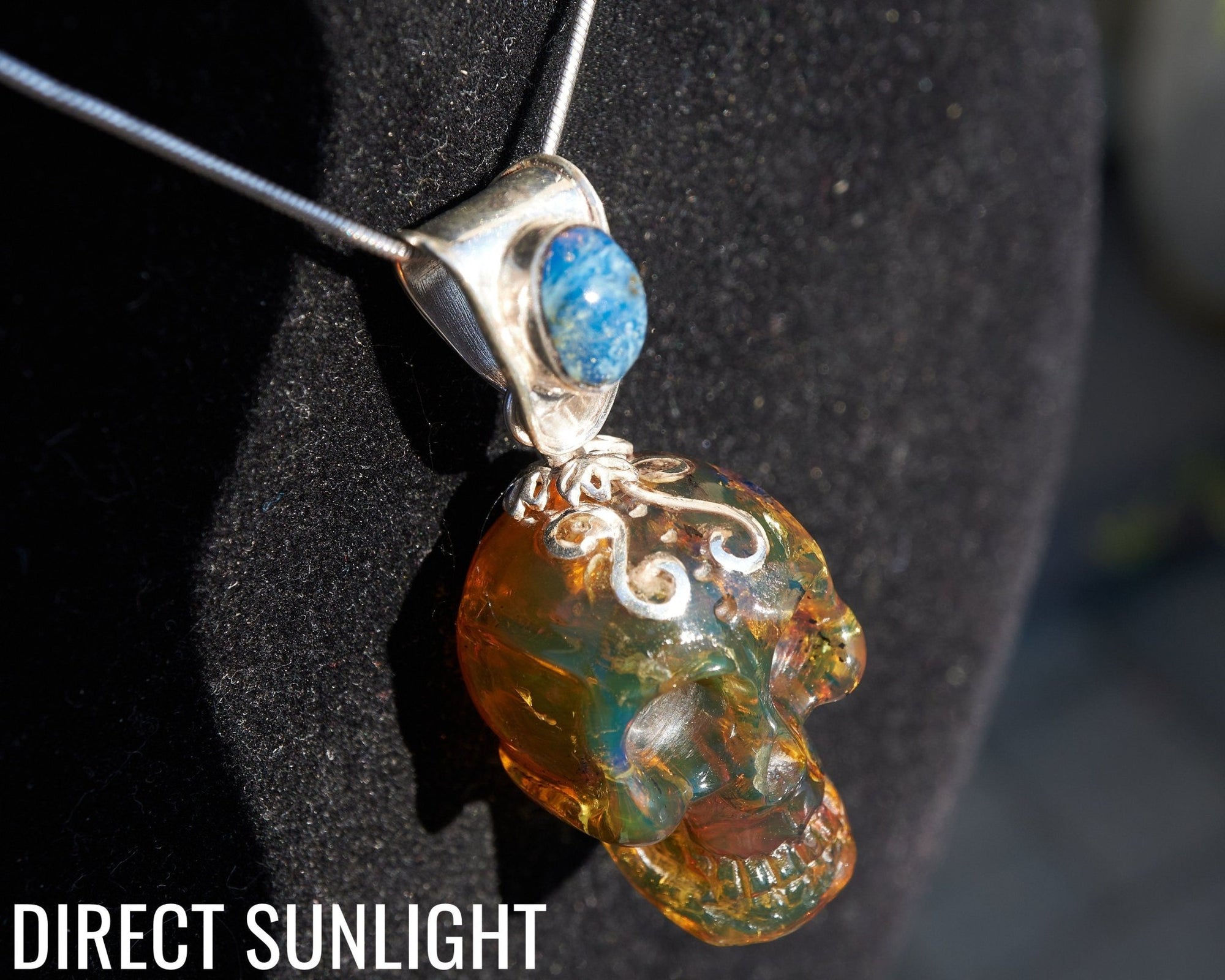 Blue &amp; Green Dominican Amber Skull Pendant | 925 Silver - Larimar Creations