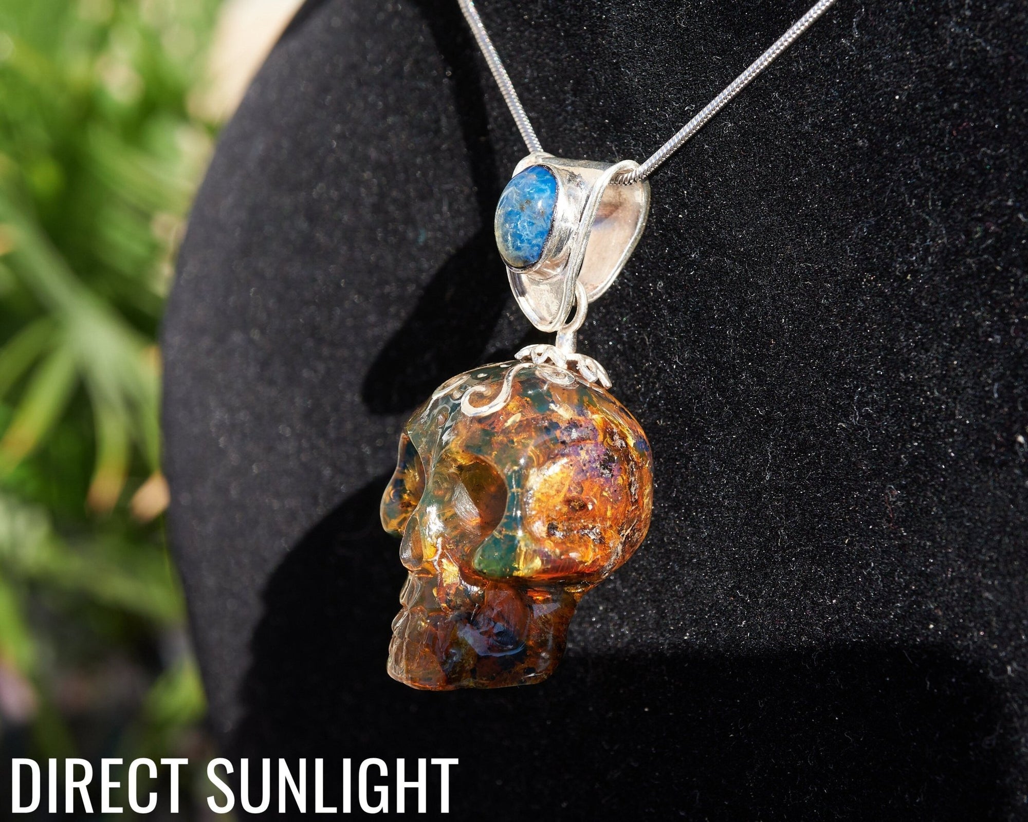 Blue &amp; Green Dominican Amber Skull Pendant | 925 Silver - Larimar Creations