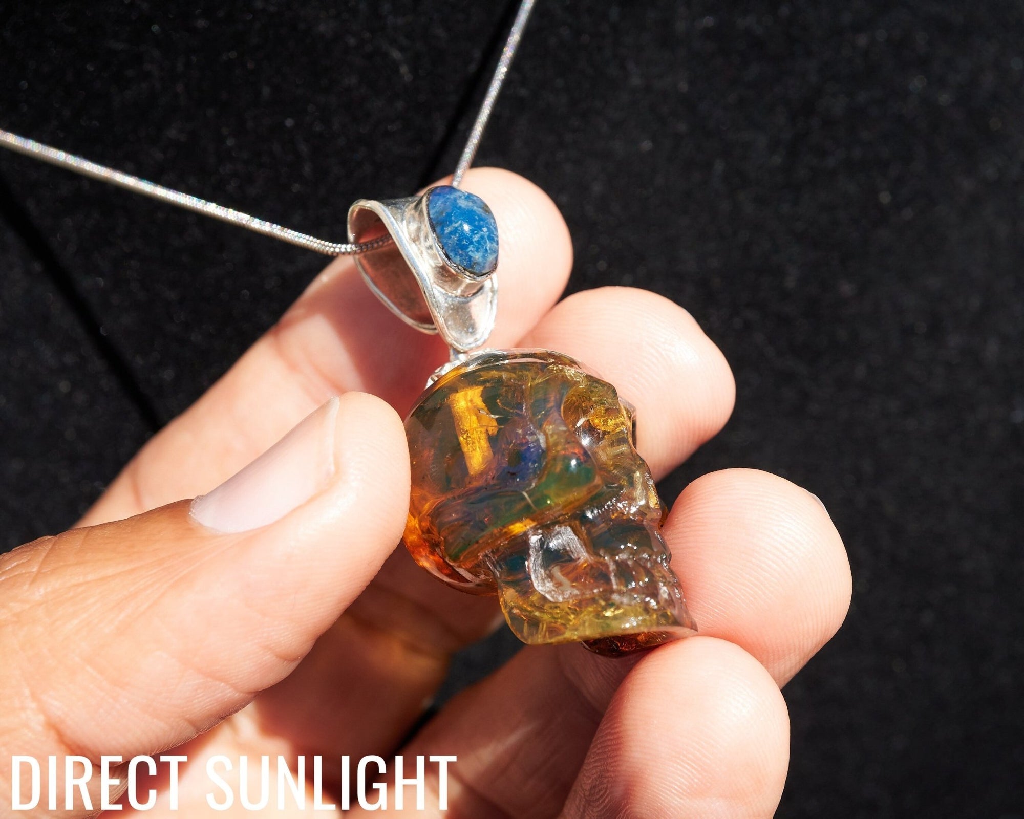 Blue &amp; Green Dominican Amber Skull Pendant | 925 Silver - Larimar Creations