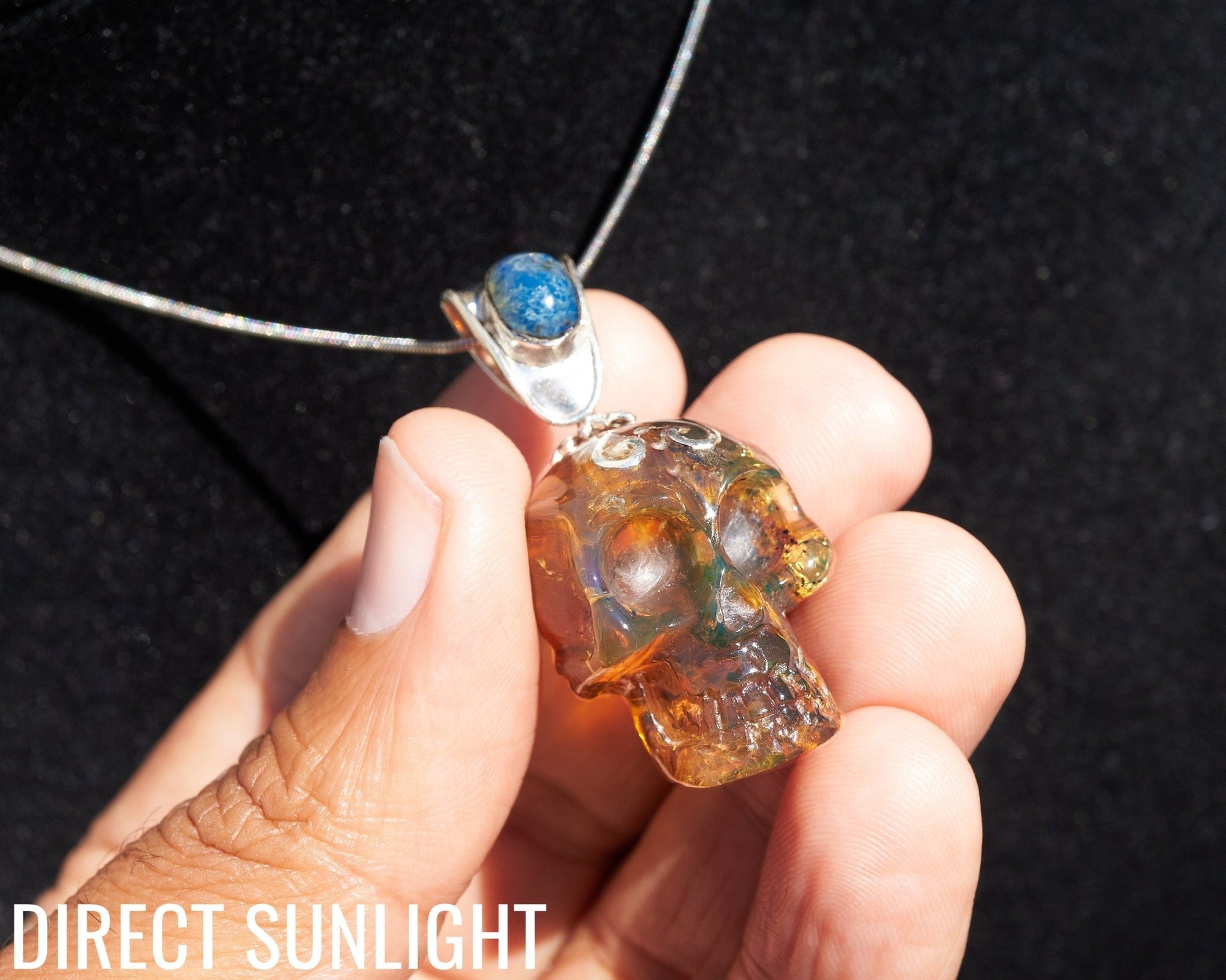 Blue &amp; Green Dominican Amber Skull Pendant | 925 Silver - Larimar Creations